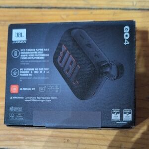 NWT JBL GO 4 Bluetooth Speaker - Waterproof in Black W/ Orange Detail